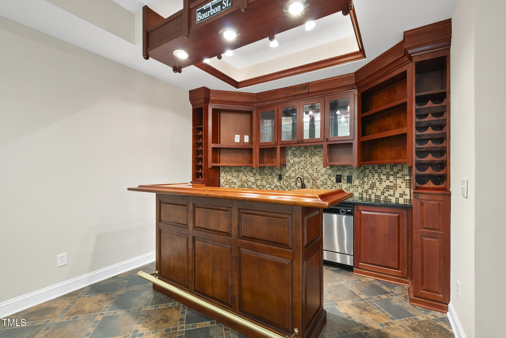 12257 Beestone Lane Raleigh, NC 27614 - Photo 40 of 59 a kitchen with stainless steel appliances granite countertop a stove and a wooden cabinets