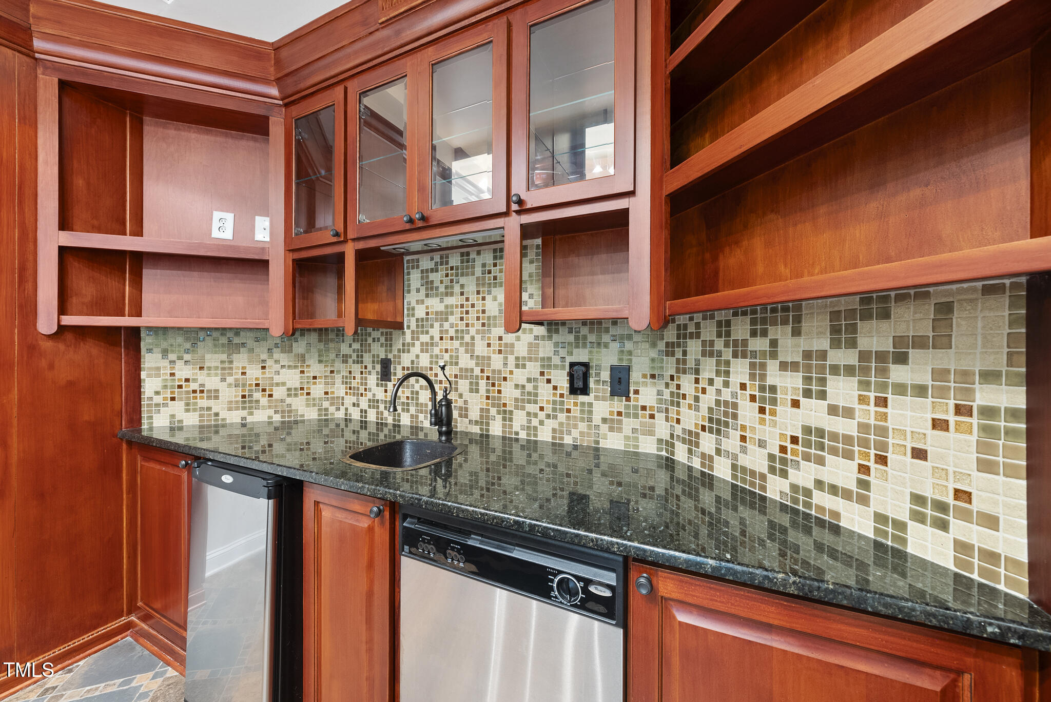 12257 Beestone Lane Raleigh, NC 27614 - Photo 42 of 59 a kitchen with a sink and cabinets