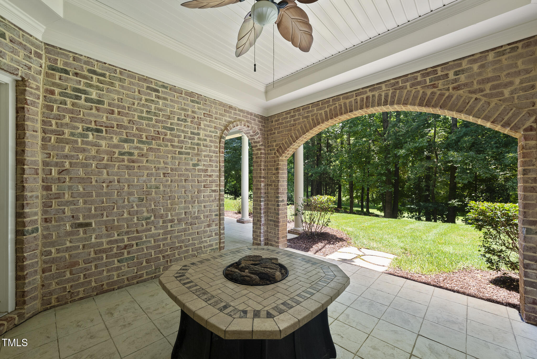 12257 Beestone Lane Raleigh, NC 27614 - Photo 49 of 59 a view of a porch with furniture and garden