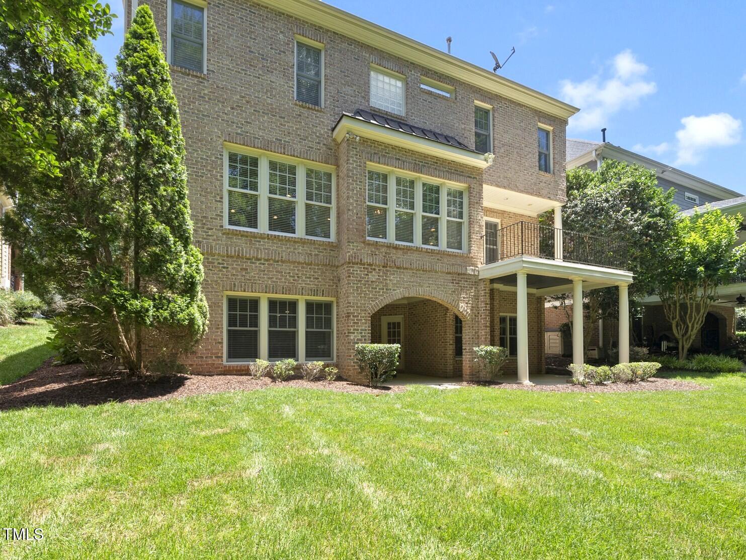 12257 Beestone Lane Raleigh, NC 27614 - Photo 52 of 59 a view of a house with a yard and plants