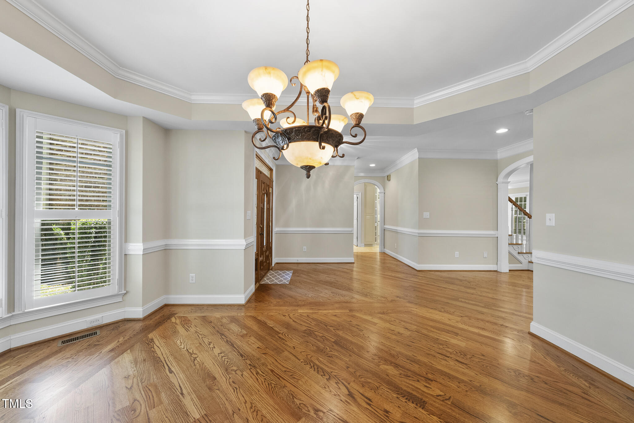 12257 Beestone Lane Raleigh, NC 27614 - Photo 5 of 59 a view of a livingroom with a chandelier