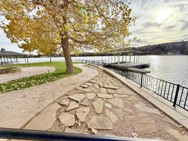 a kitchen with a stove a sink and a microwave
