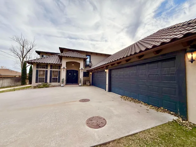 a view of a swimming pool with sitting area