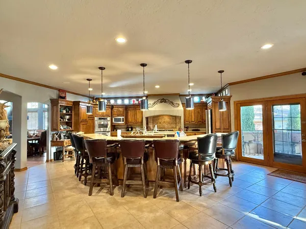 a bathroom with a sink vanity and mirror