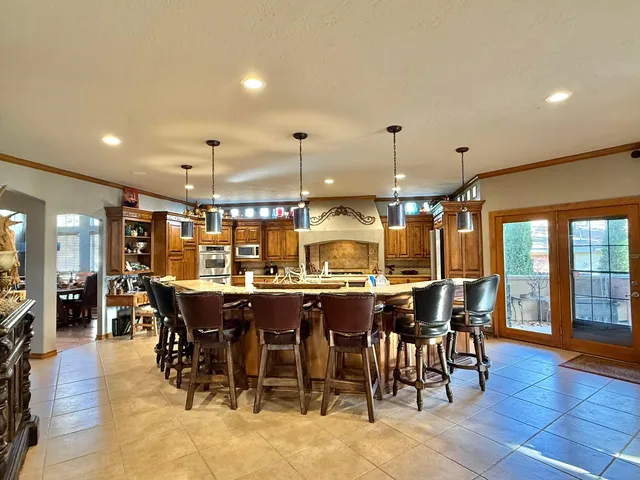 a bathroom with a sink vanity and mirror