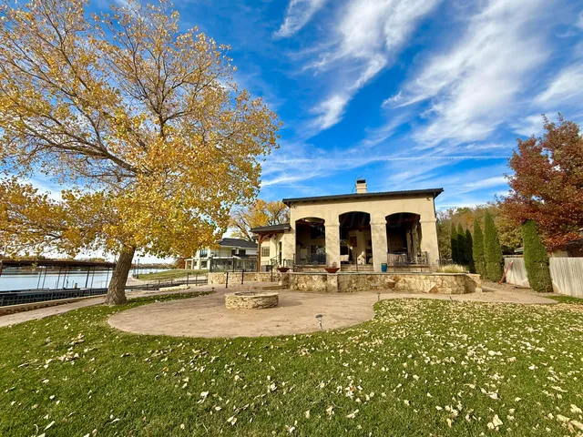 a view of a lake with outdoor space