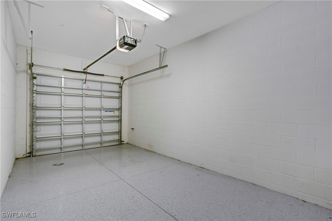 2343 Sheen Lane, Unit 401 Naples, FL 34120 - Photo 18 of 40 a view of a garage