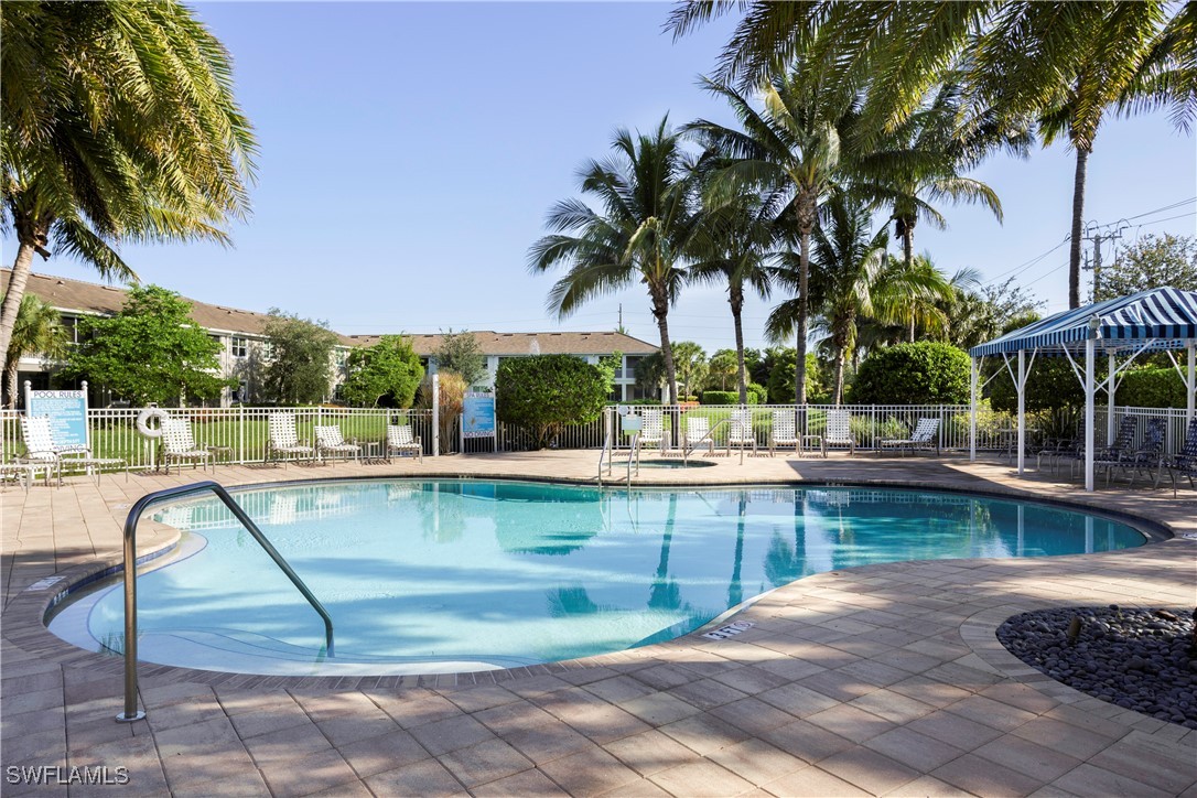 2343 Sheen Lane, Unit 401 Naples, FL 34120 - Photo 29 of 40 a view of swimming pool with a patio