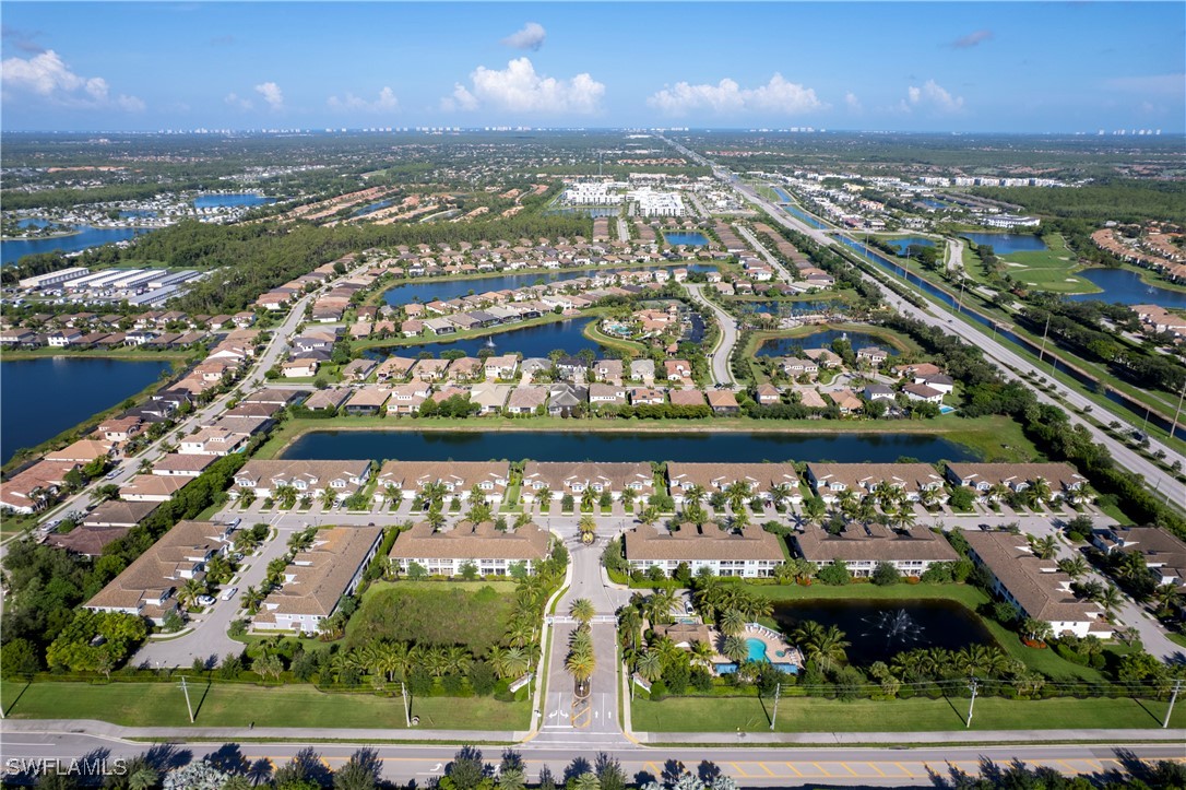 2343 Sheen Lane, Unit 401 Naples, FL 34120 - Photo 31 of 40 an aerial view of residential houses with outdoor space