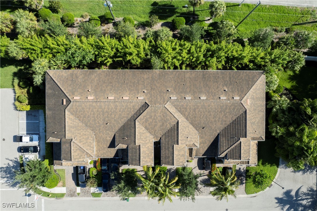 2343 Sheen Lane, Unit 401 Naples, FL 34120 - Photo 34 of 40 an aerial view of a house with a yard