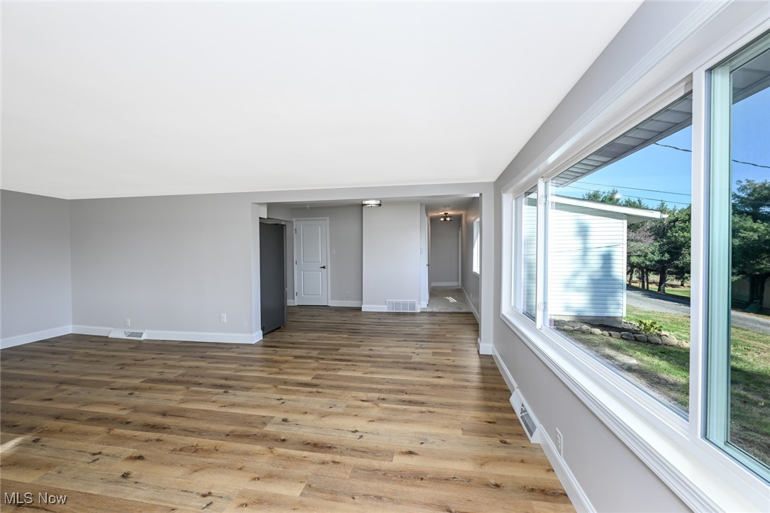 14328 Calaboone Road Doylestown, OH 44230 - Photo 11 of 45 Living room leading into the kitchen and back hallway to bedrooms