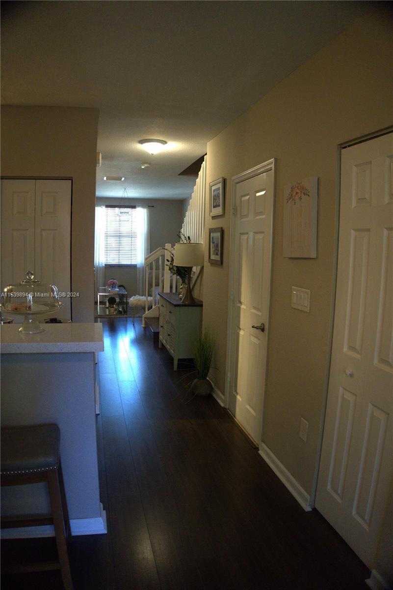 9143 Southwest 227th Street, Unit 3 Cutler Bay, FL 33190 - Photo 14 of 35 a view of kitchen and dining room
