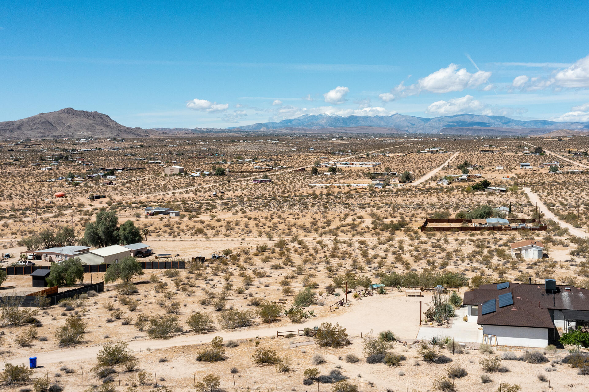 140 Rice Avenue Joshua Tree, CA 92252 - Photo 11 of 24 an aerial view of residential houses with outdoor space