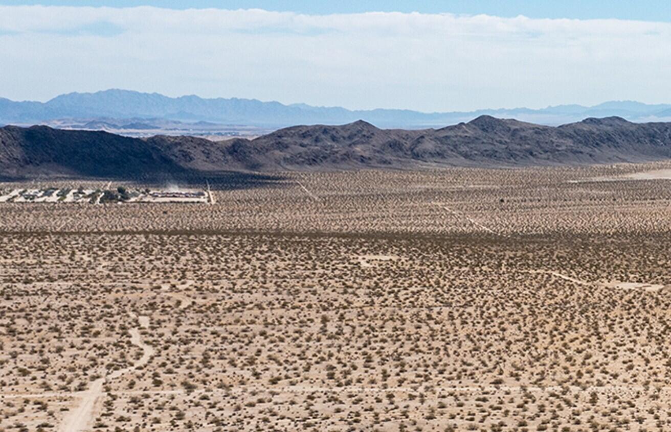 140 Rice Avenue Joshua Tree, CA 92252 - Photo 20 of 24 a view of a mountain with a mountain view