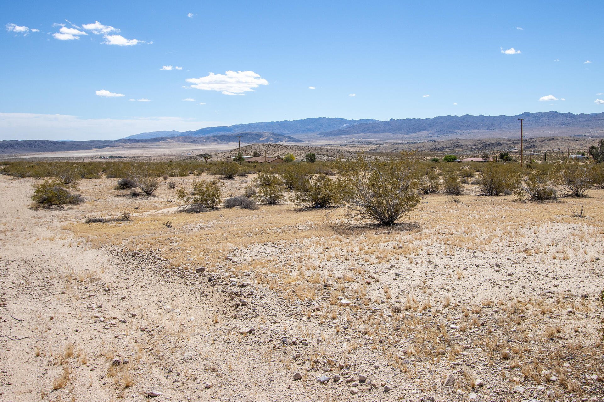 140 Rice Avenue Joshua Tree, CA 92252 - Photo 9 of 24 a view of lake with mountain
