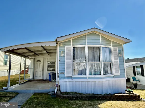 a front view of a house with balcony