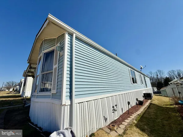 a balcony view with a flat screen tv