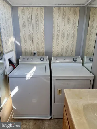 a living room with furniture and window