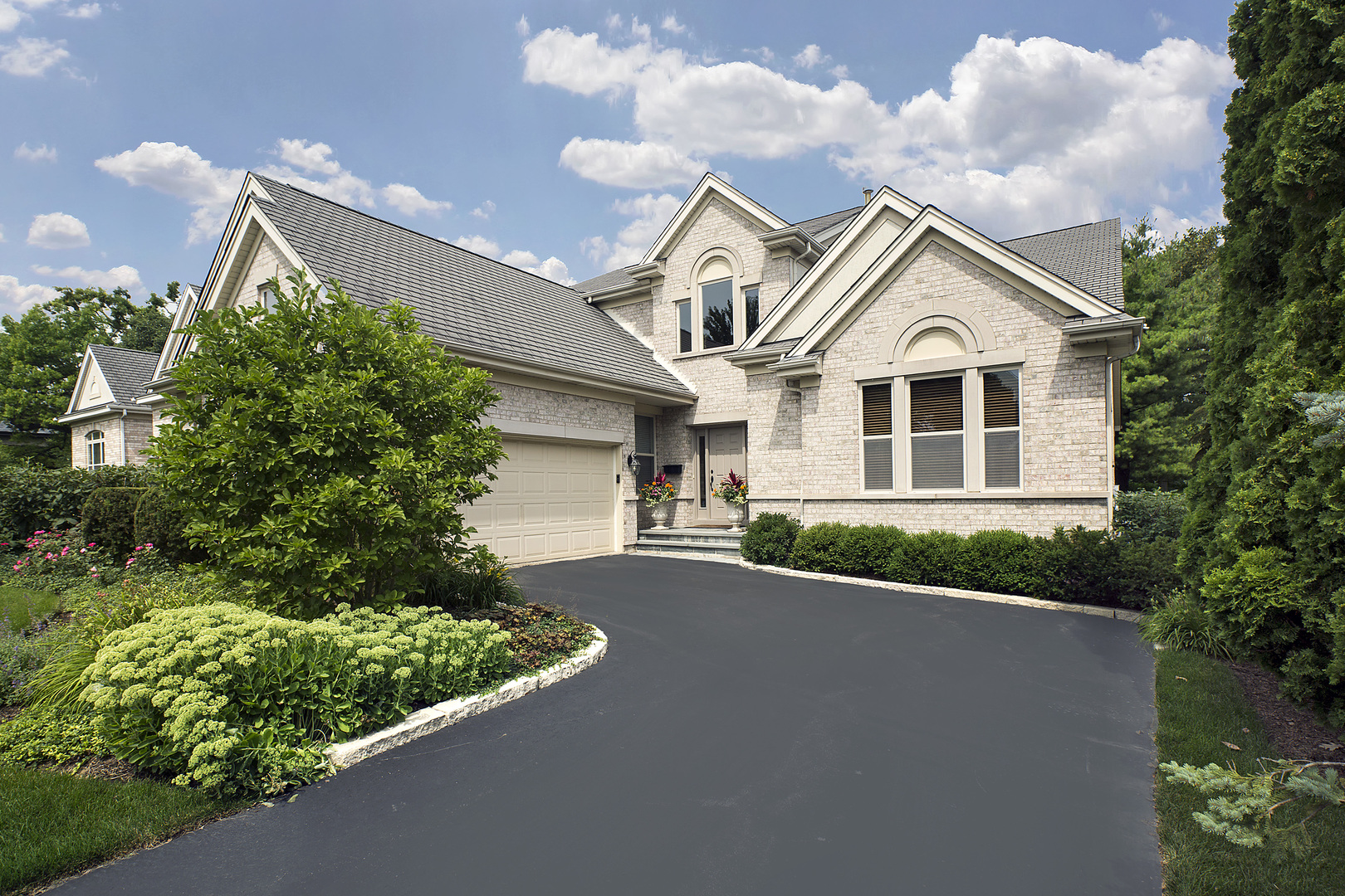 124 Ronan Road Highwood, IL 60040 - Photo 1 of 25 a view of a house with a yard and potted plants