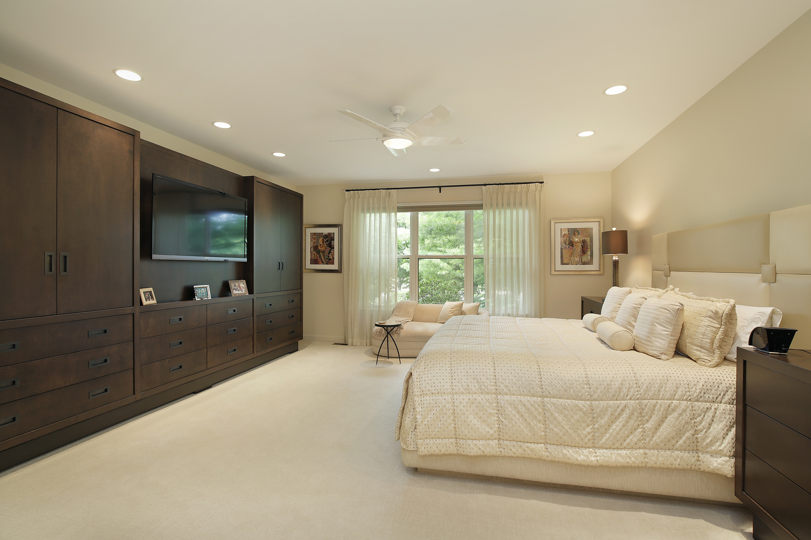 124 Ronan Road Highwood, IL 60040 - Photo 13 of 25 a bedroom with a large bed and a flat screen tv