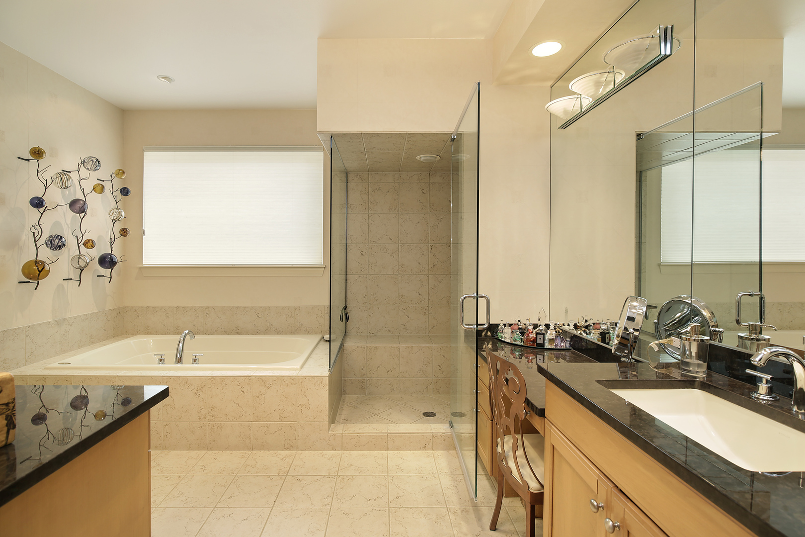 124 Ronan Road Highwood, IL 60040 - Photo 14 of 25 a bathroom with a granite countertop sink a bathtub and shower