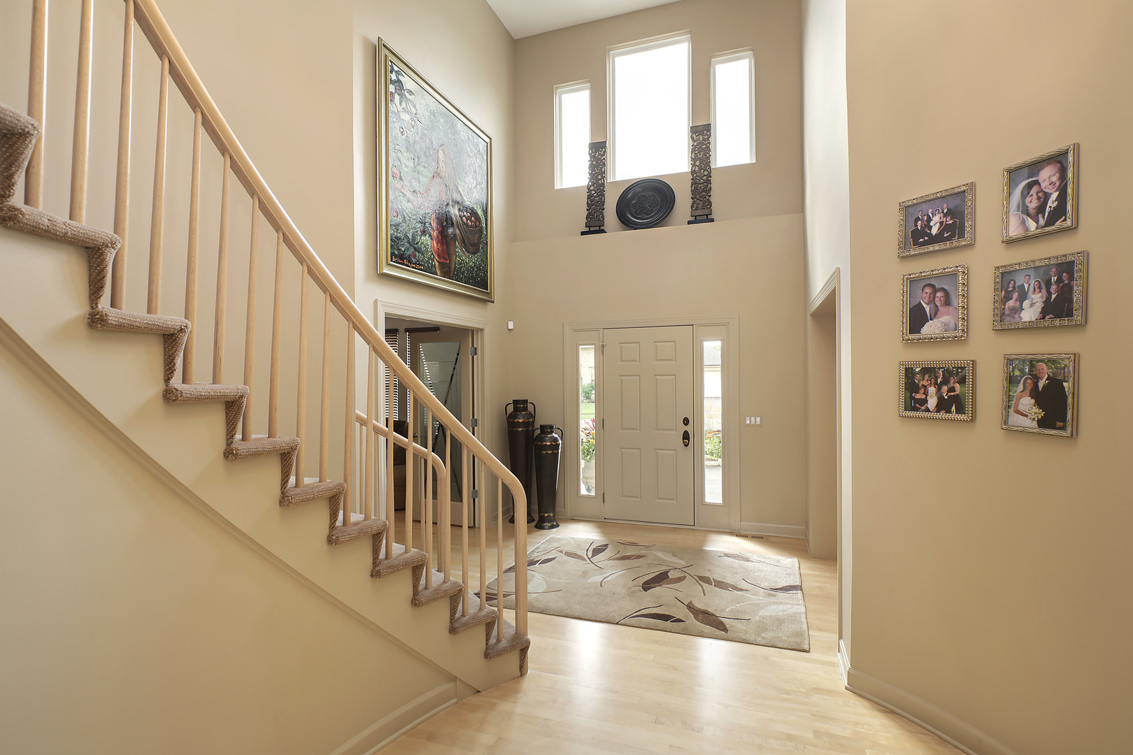 124 Ronan Road Highwood, IL 60040 - Photo 3 of 25 a view of entryway and hall with wooden floor