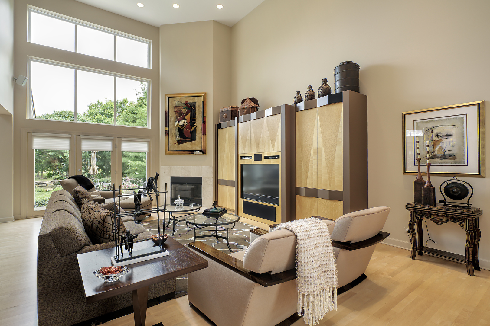 124 Ronan Road Highwood, IL 60040 - Photo 5 of 25 a living room with furniture a large window and a fireplace