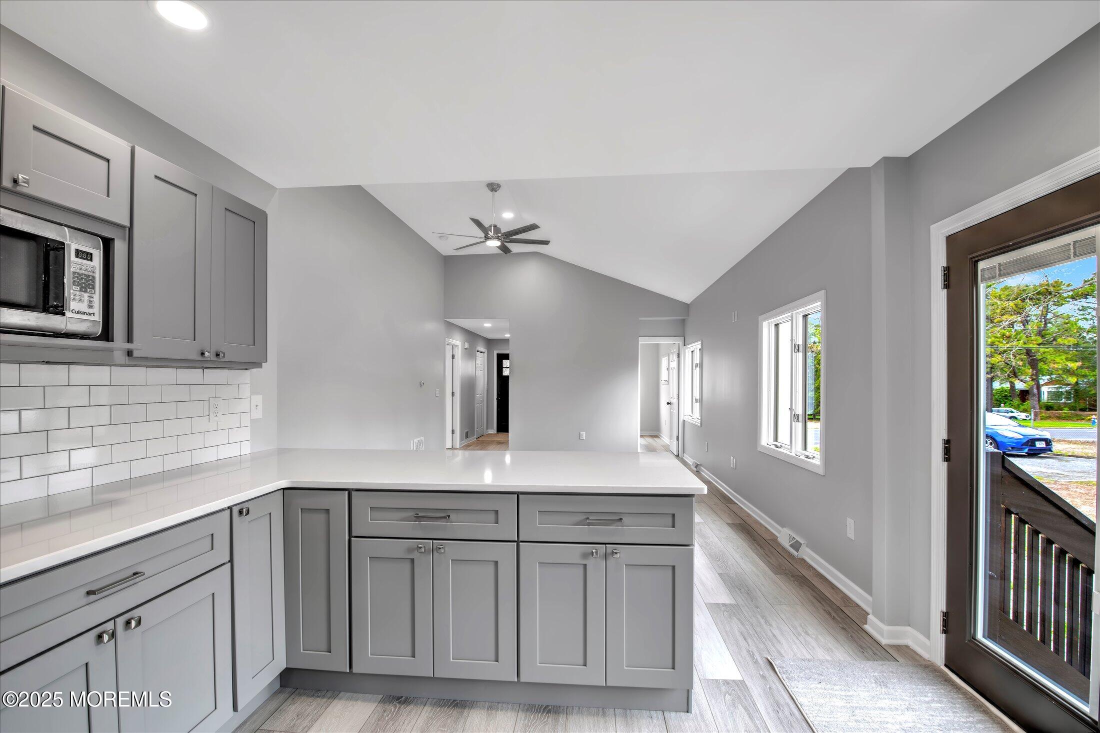314 Motor Road Pine Beach, NJ 08741 - Photo 14 of 38 a view of a kitchen cabinets a sink and wooden floor