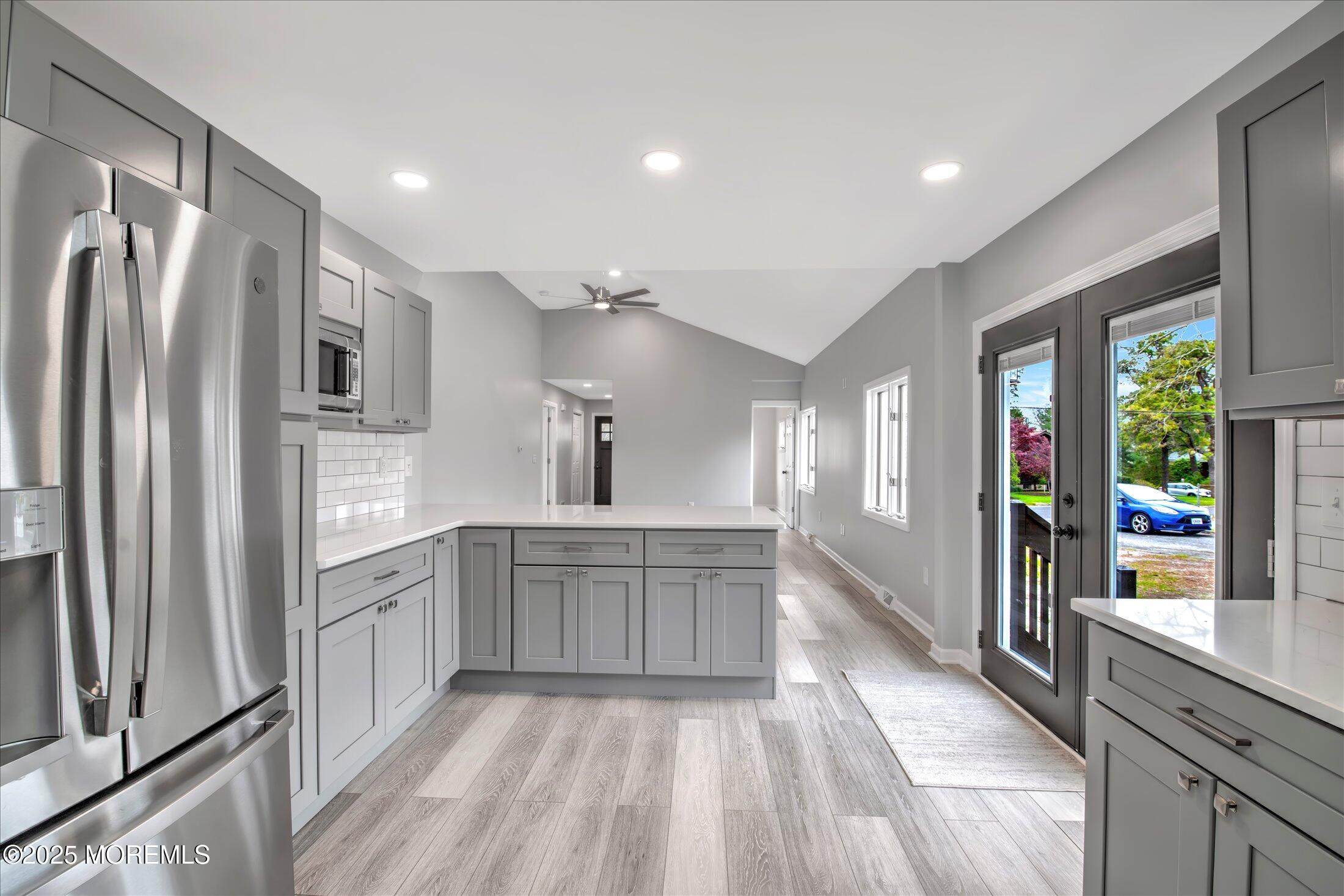 314 Motor Road Pine Beach, NJ 08741 - Photo 19 of 38 a large kitchen with cabinets and stainless steel appliances