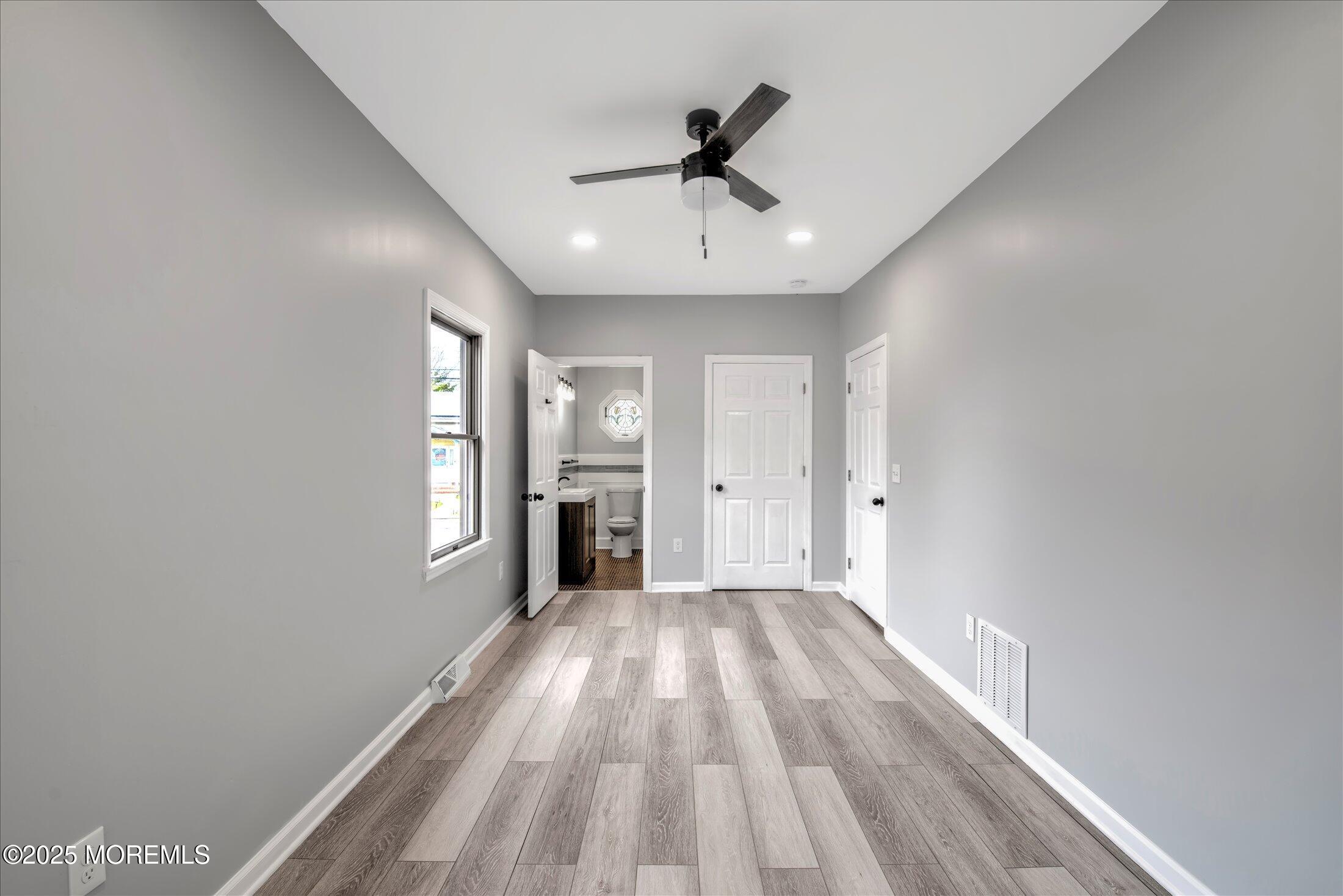 314 Motor Road Pine Beach, NJ 08741 - Photo 23 of 38 a view of an empty room and window
