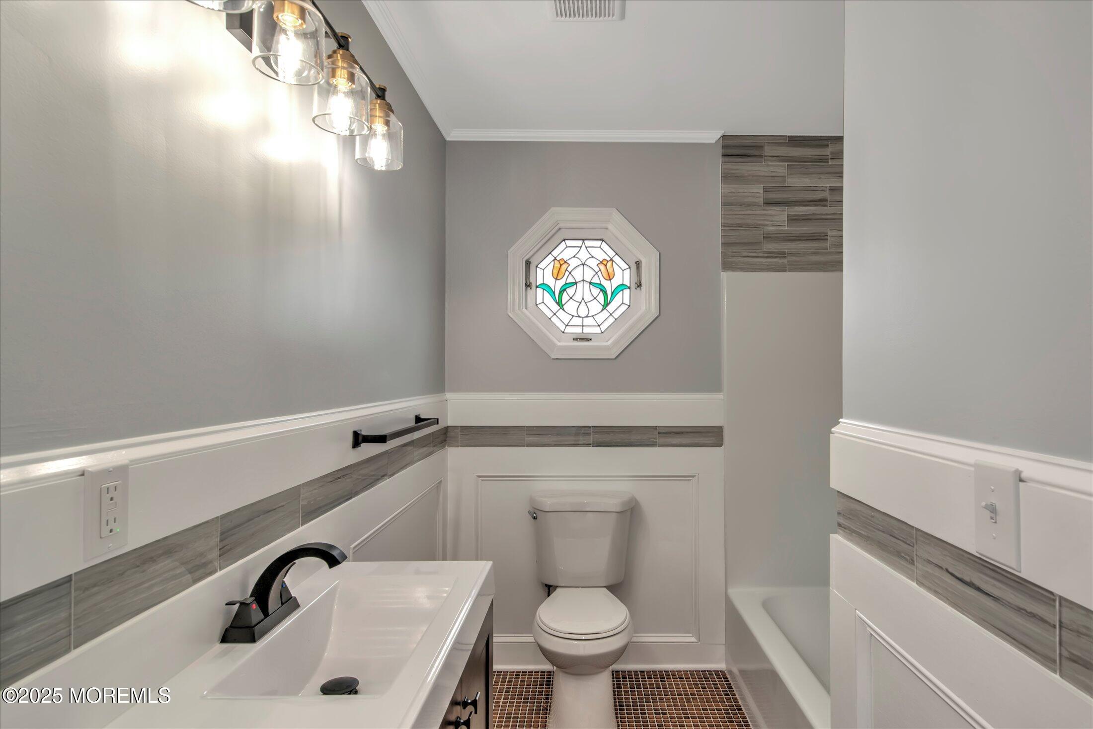 314 Motor Road Pine Beach, NJ 08741 - Photo 24 of 38 a bathroom with a toilet and a sink