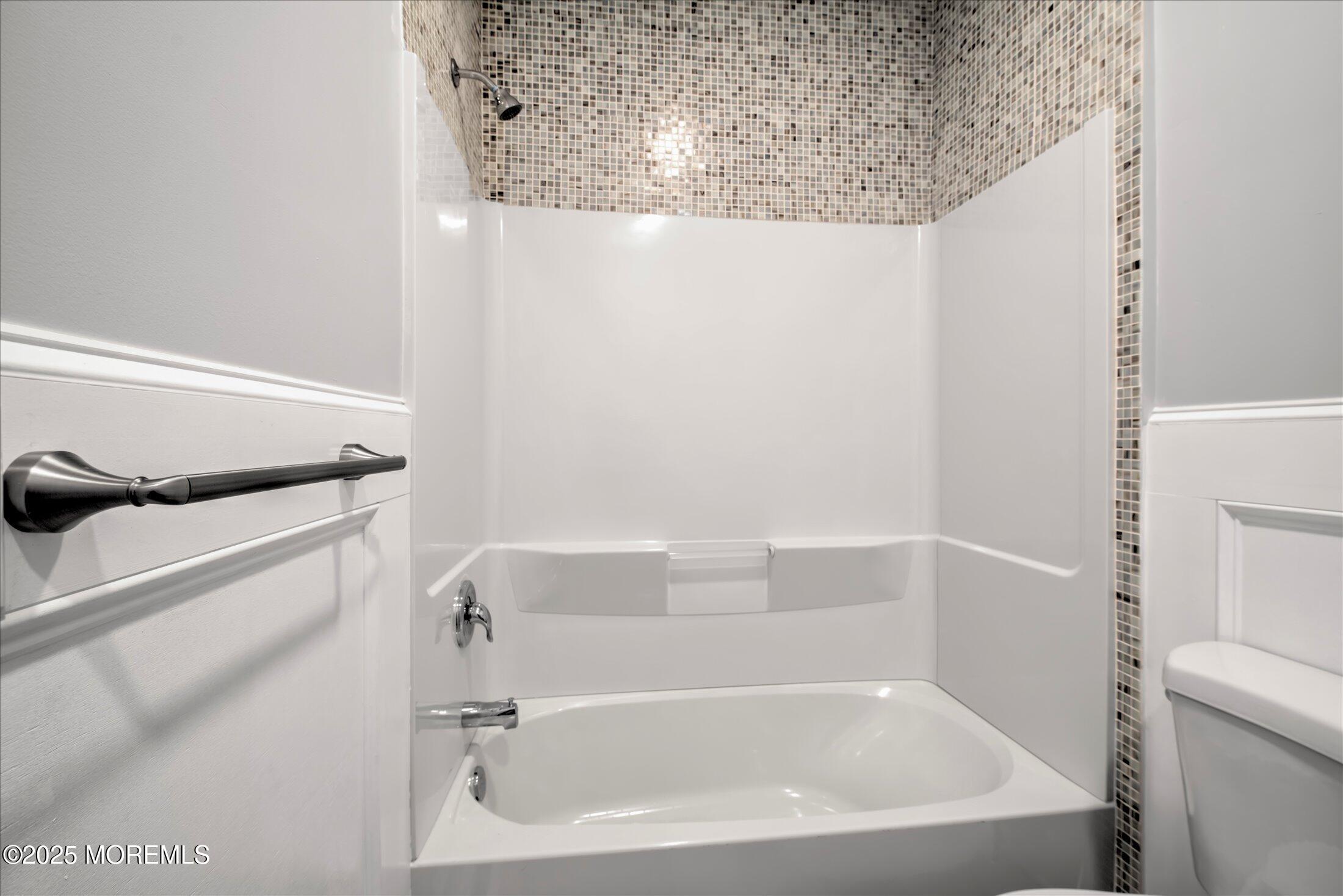 314 Motor Road Pine Beach, NJ 08741 - Photo 32 of 38 a bathroom with a bathtub