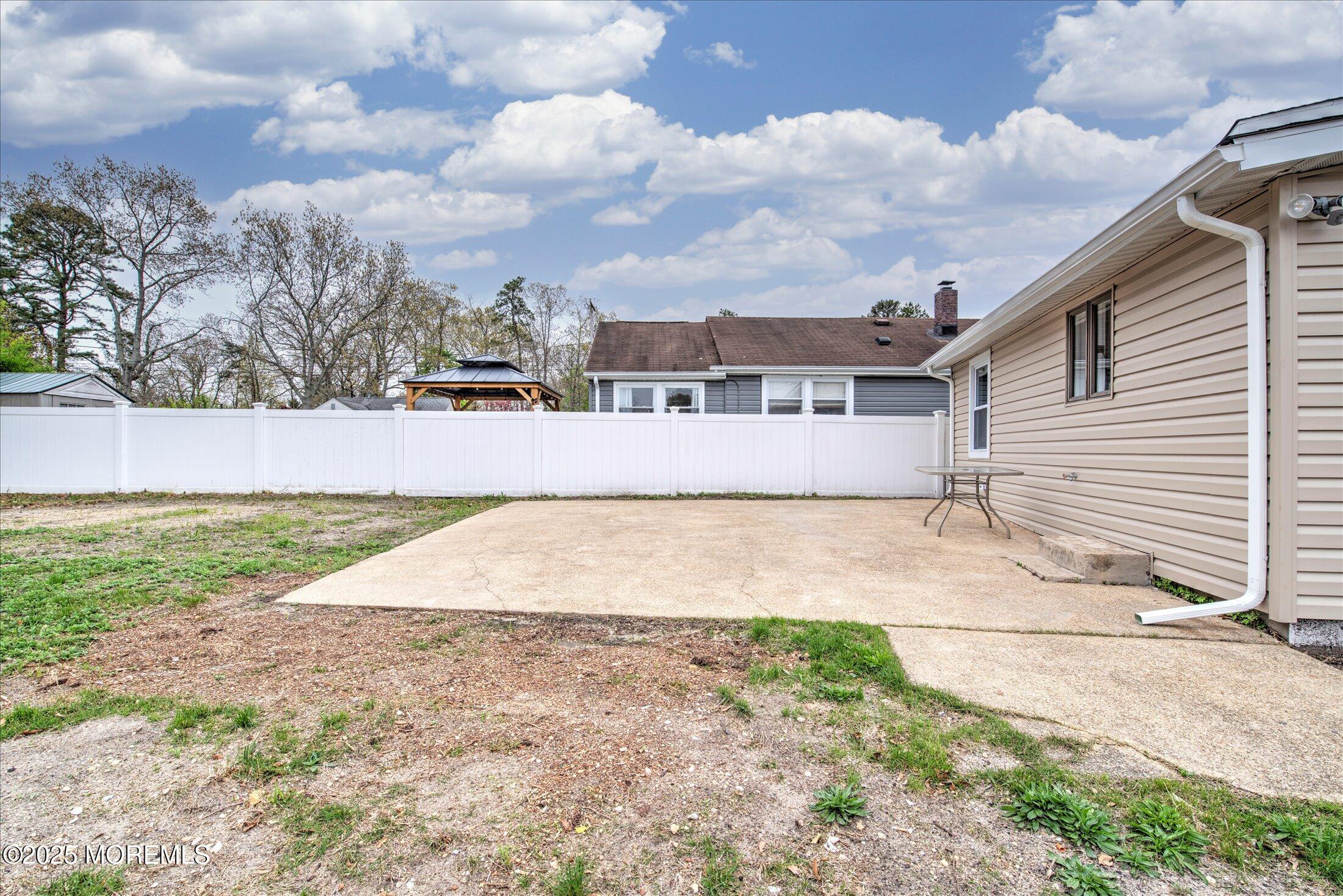 314 Motor Road Pine Beach, NJ 08741 - Photo 34 of 38 a view of a yard in front of a house