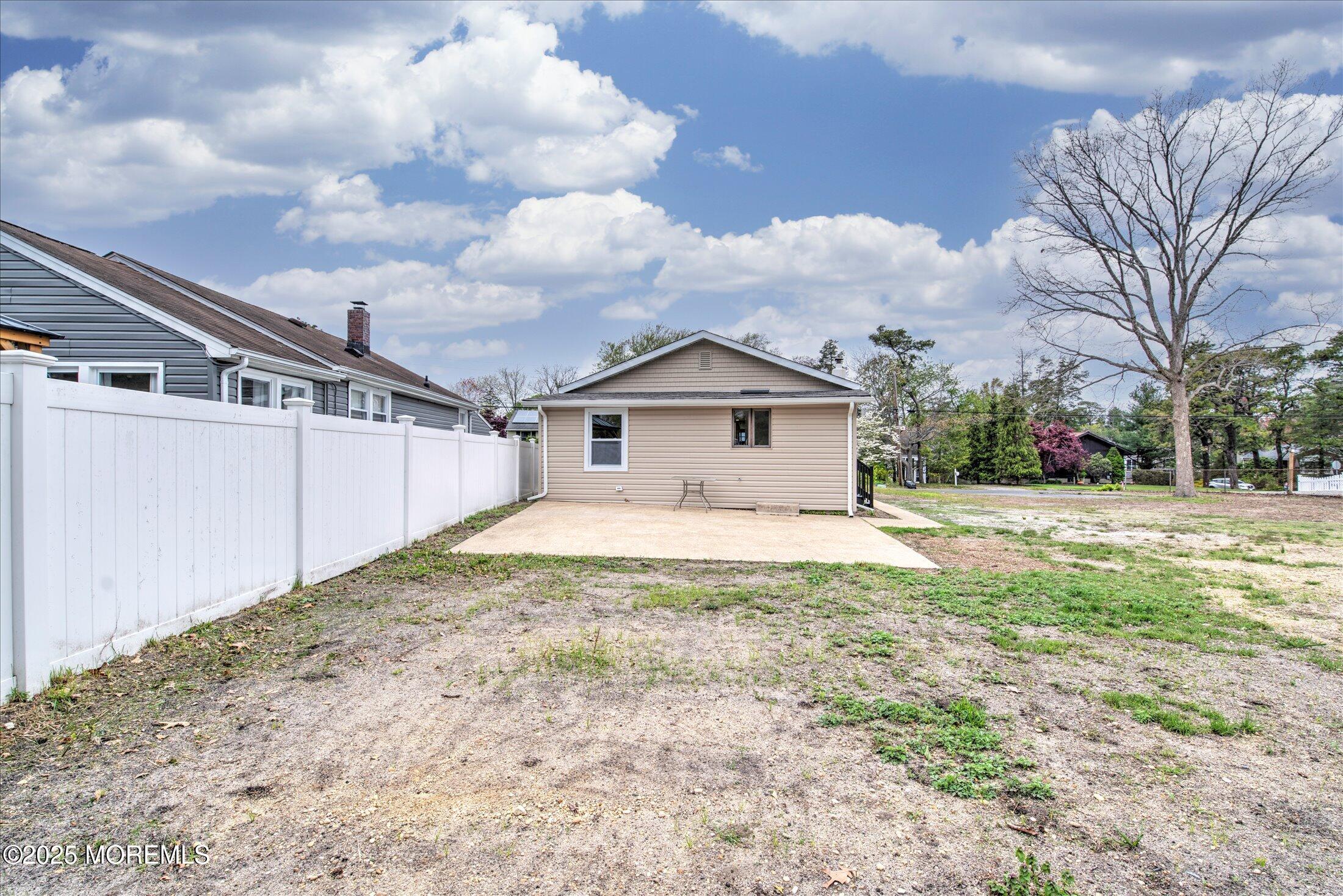 314 Motor Road Pine Beach, NJ 08741 - Photo 35 of 38 a view of a house with a backyard