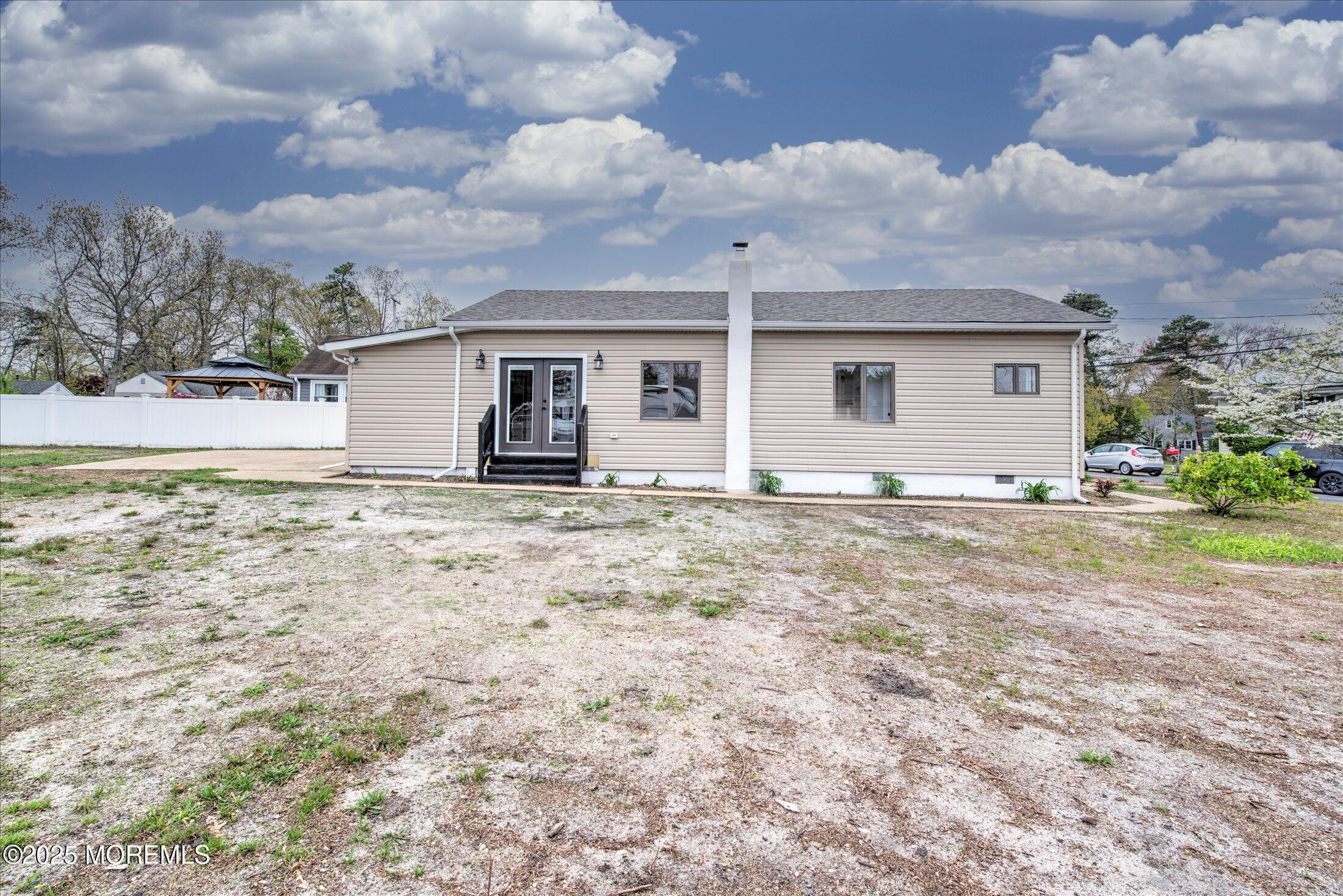 314 Motor Road Pine Beach, NJ 08741 - Photo 37 of 38 a view of a house with backyard and garden