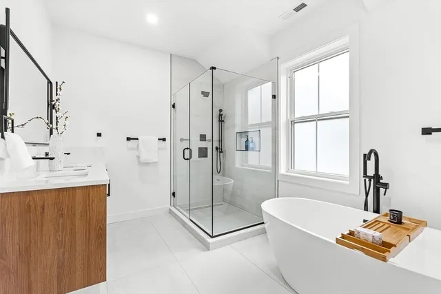 a bedroom with a bed and a cabinets