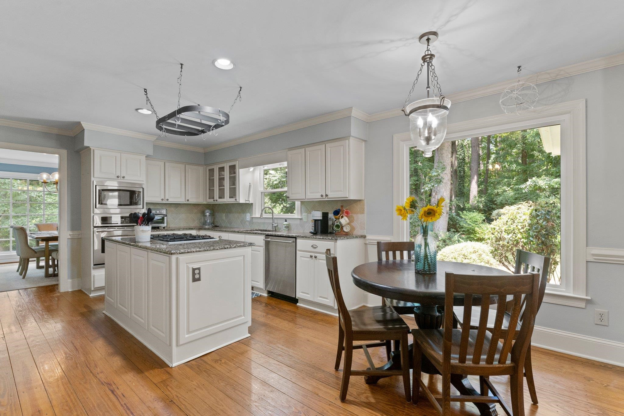 9301 Greenfield Drive Raleigh, NC 27615 - Photo 10 of 48 Kitchen and Breakfast Nook with beautiful view of the backyard. Kitchen/Breakfast Nook