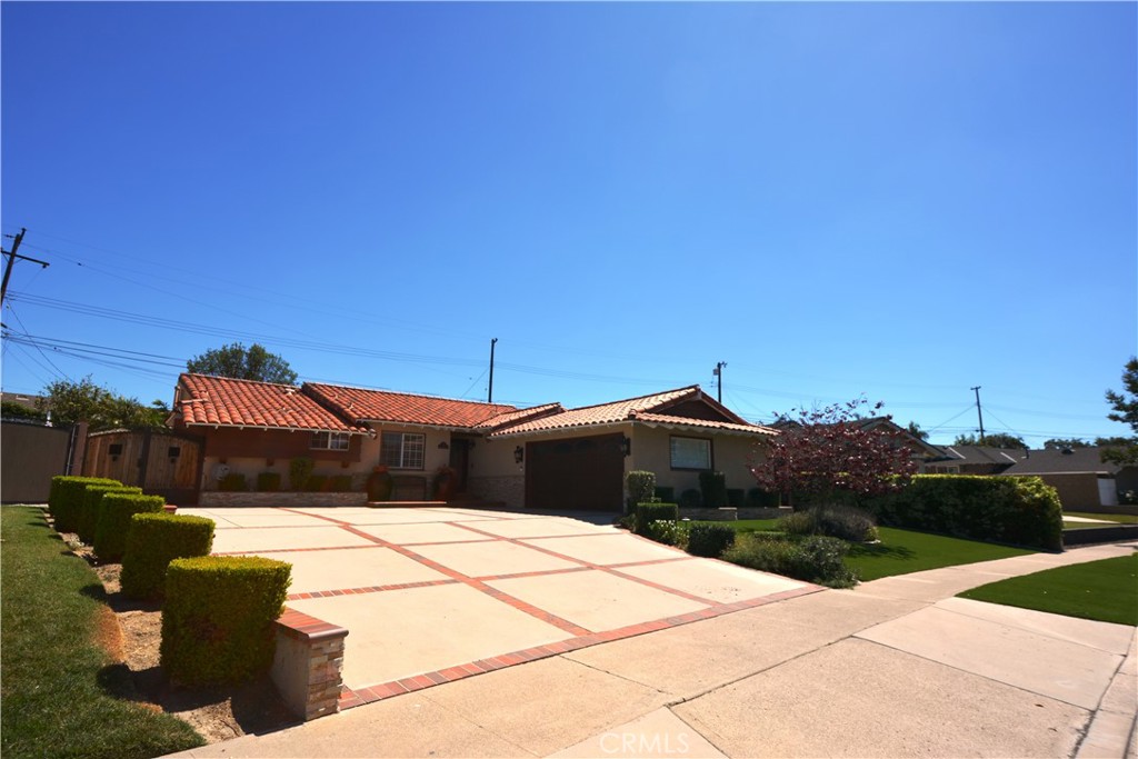 780 Ridgehaven Drive La Habra, CA 90631 - Photo 2 of 69 a front view of a house with a yard
