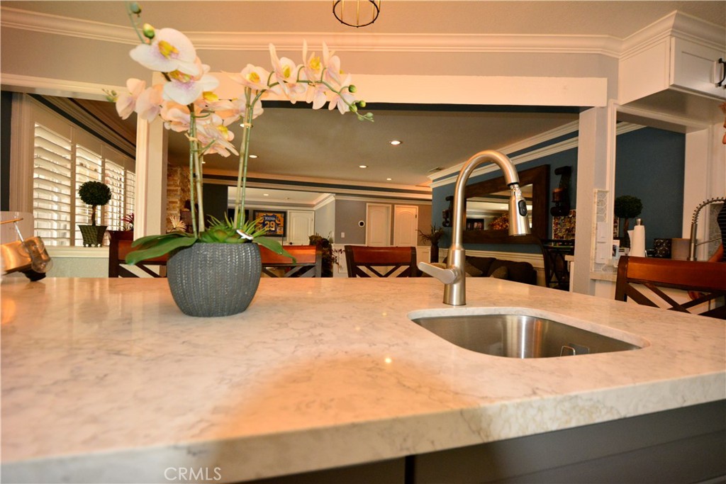 780 Ridgehaven Drive La Habra, CA 90631 - Photo 23 of 69 a kitchen with a sink and a large mirror