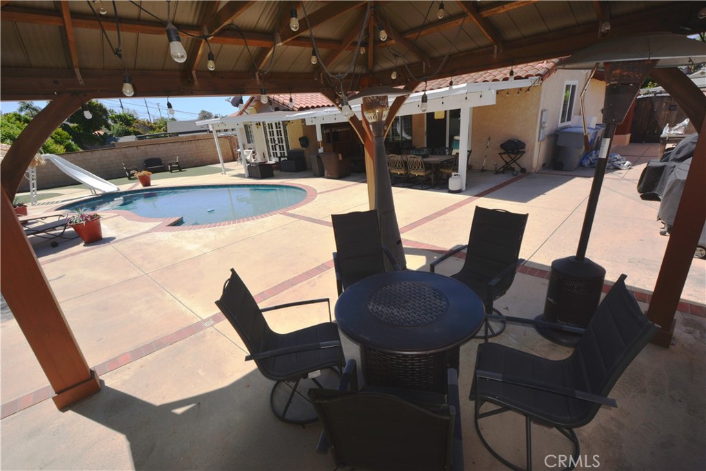 780 Ridgehaven Drive La Habra, CA 90631 - Photo 46 of 69 a view of a chairs and table in patio