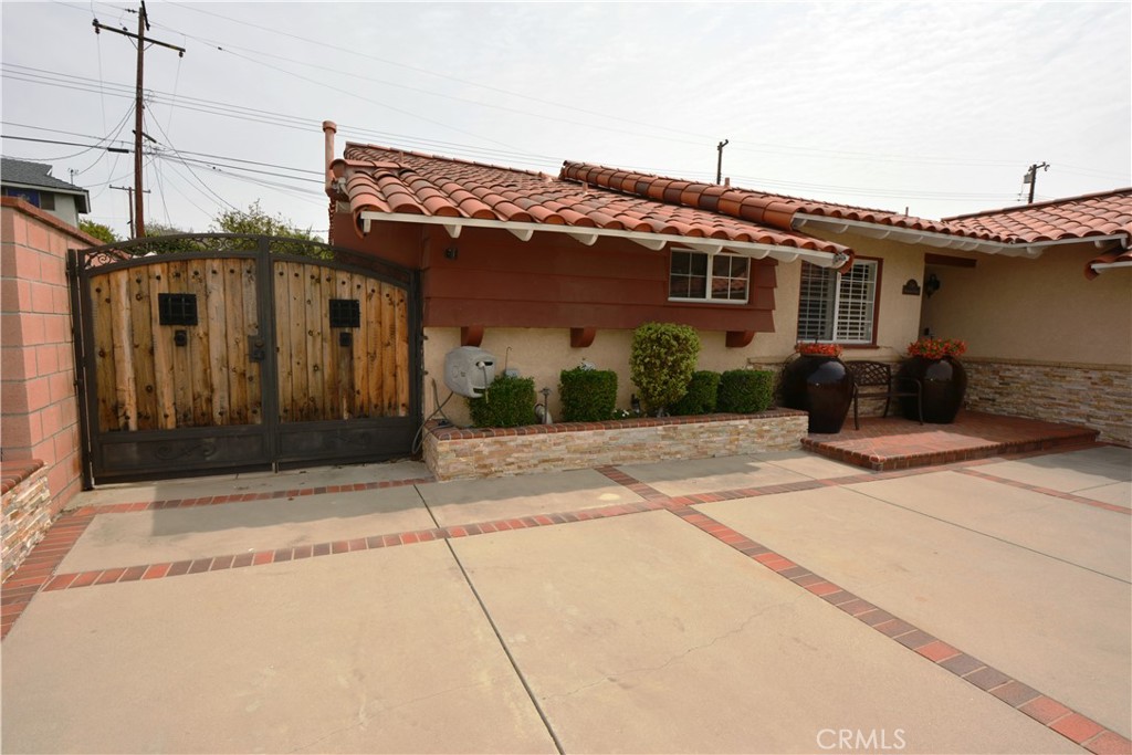 780 Ridgehaven Drive La Habra, CA 90631 - Photo 5 of 69 a front view of a house with a yard