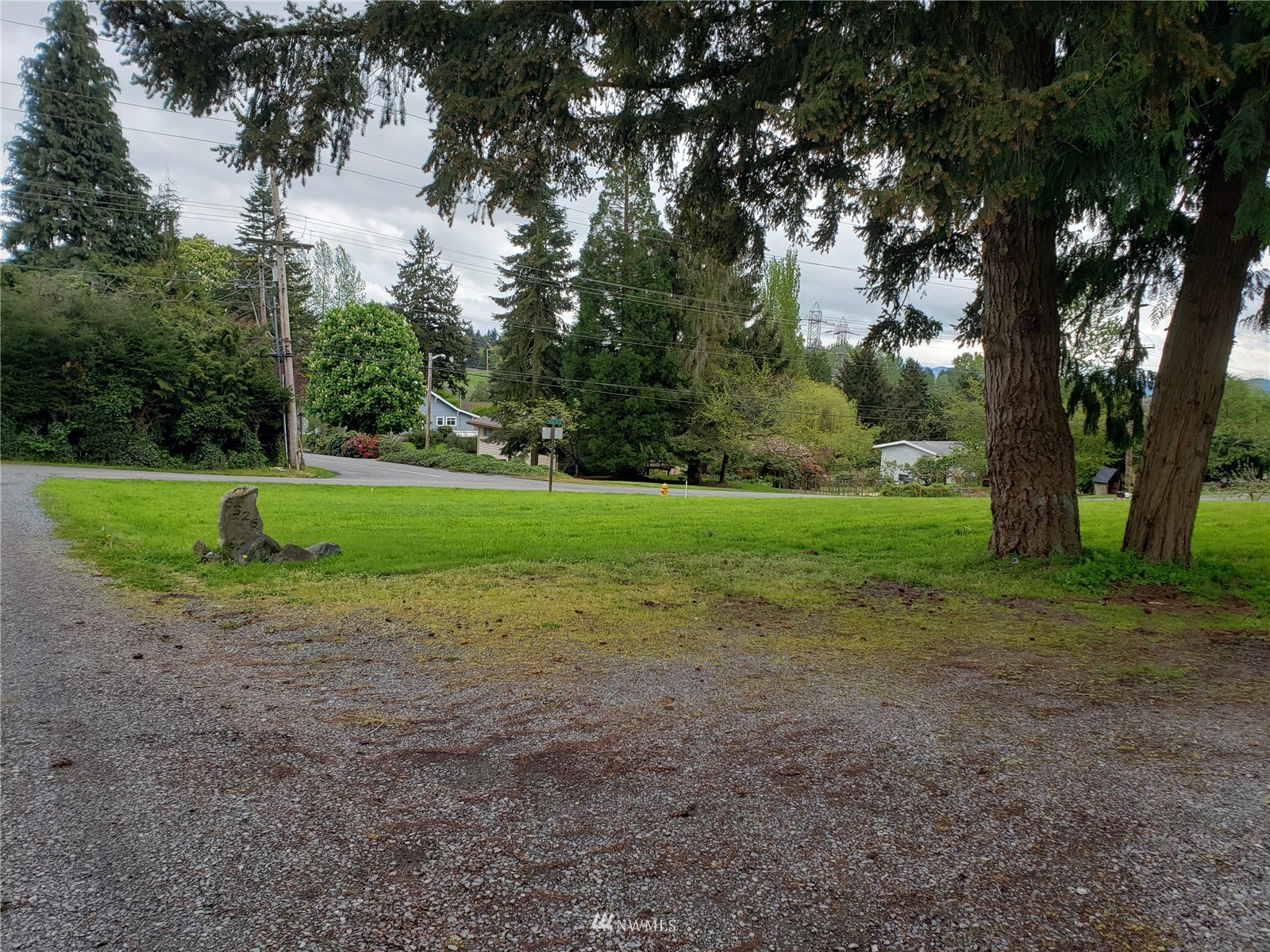 1 Lake Avenue Snohomish, WA 98290 - Photo 1 of 6 a view of a yard with tree s