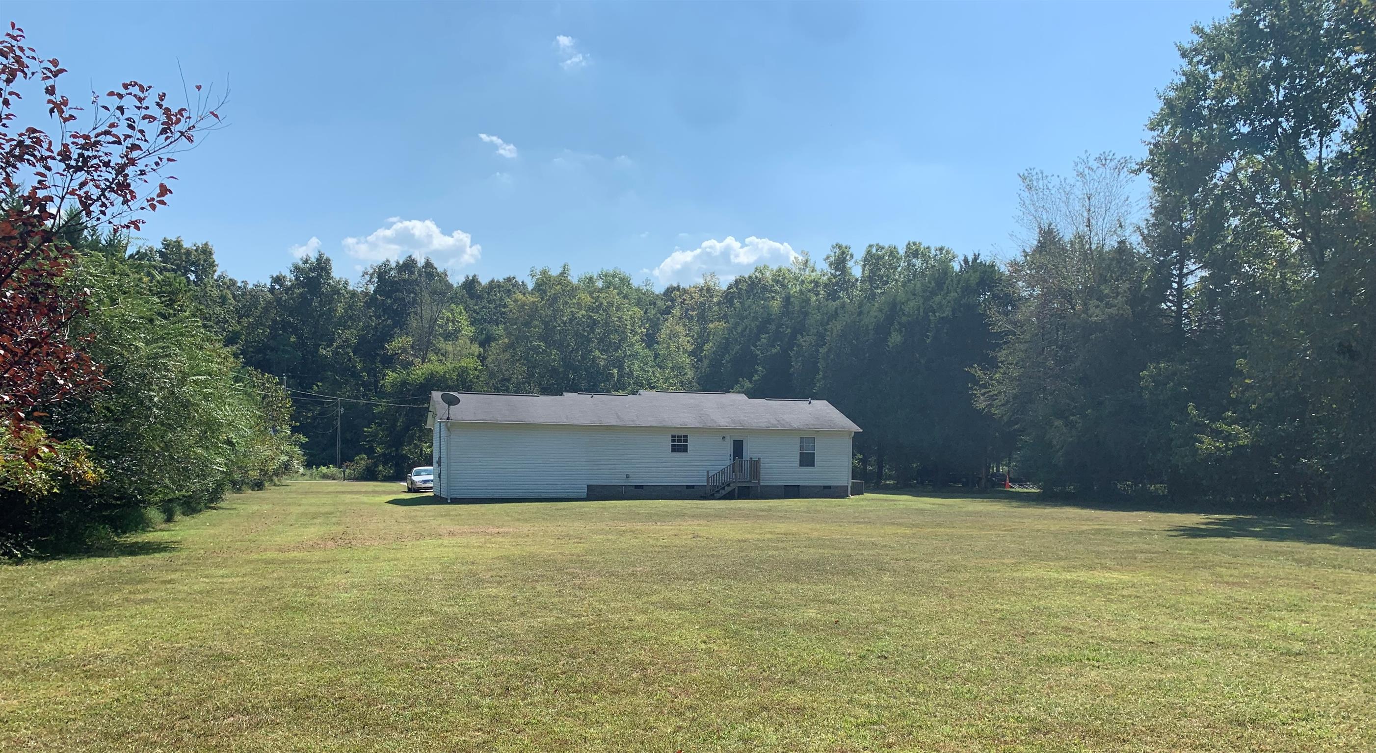 1225 Nelson Road Dickson, TN 37055 - Photo 15 of 18 a view of a tiny house with a yard