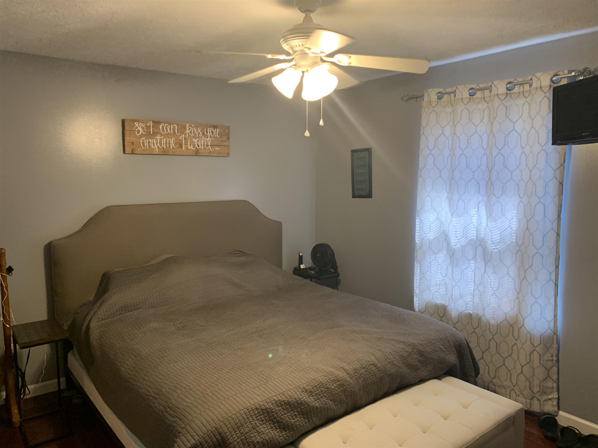 1225 Nelson Road Dickson, TN 37055 - Photo 8 of 18 a bed sitting in a bedroom next to a bathroom