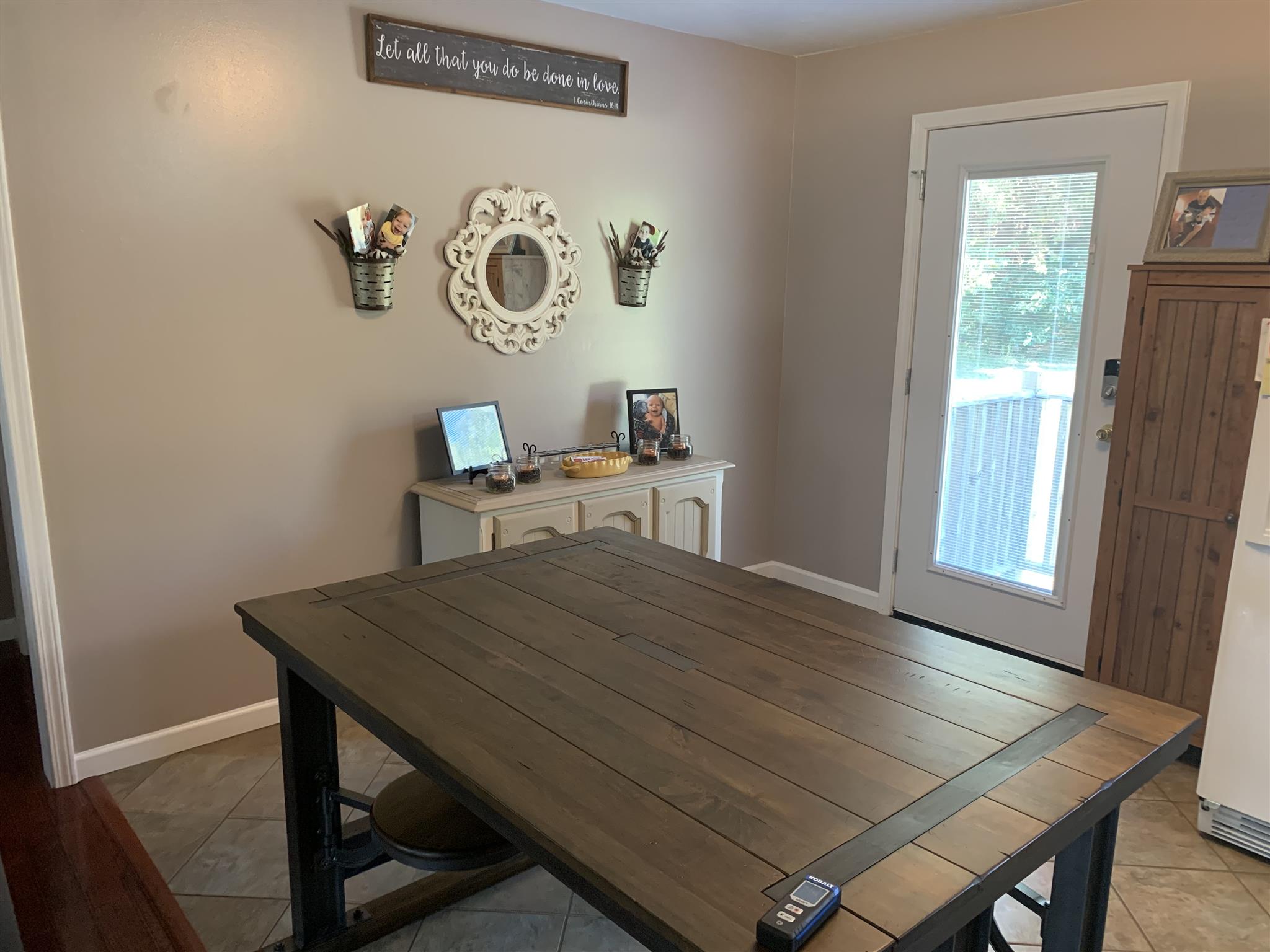 1225 Nelson Road Dickson, TN 37055 - Photo 9 of 18 a workspace with furniture and window
