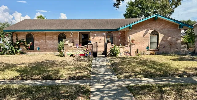 a view of a house with snow on the wall