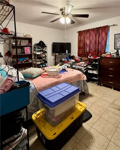 a room with furniture and a flat screen tv