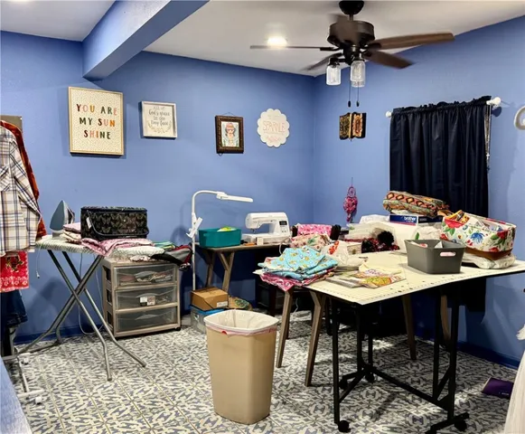 a dining room with a table and chairs