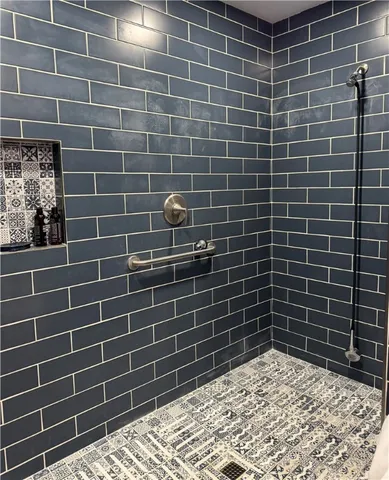 a bathroom with a sink and a shower