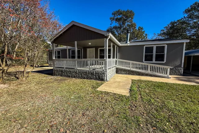 a front view of house with yard